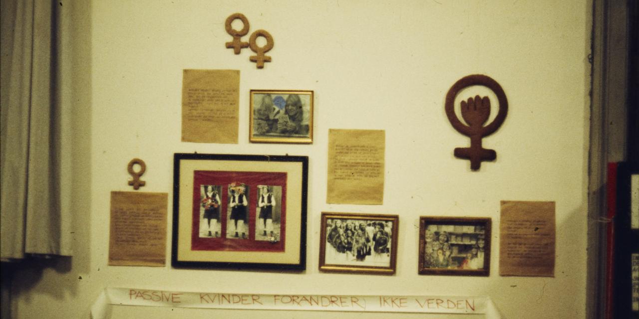 Pictures on wall from the Women's exhibition.