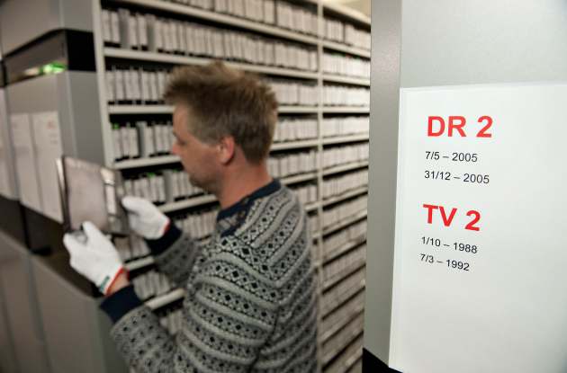 Employee between shelves in the Radio Tv Collection