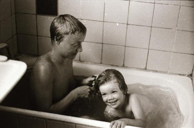 Child and woman in bathtub