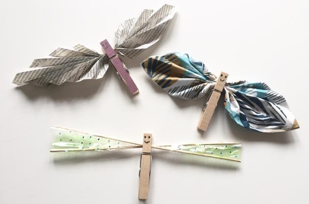 Butterflies made of paper and clothespins