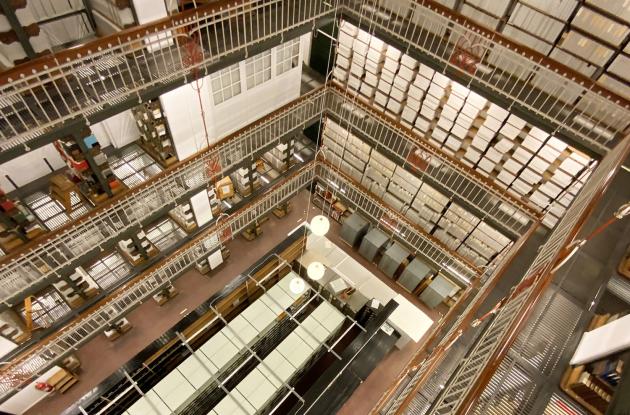 Danish Hall, Det Kgl. Bibliotek. Bird's eye view down through floors full of shelves