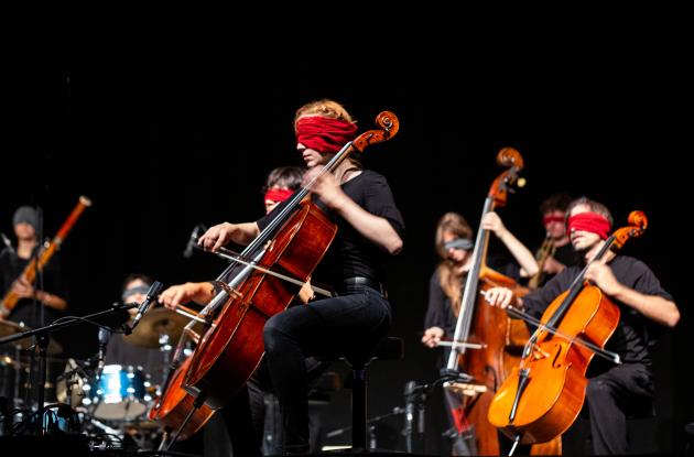 Stegreif Orchestra plays instruments blindfolded on stage