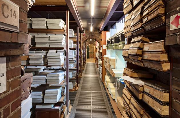 Shelves with archive fluids and old prints