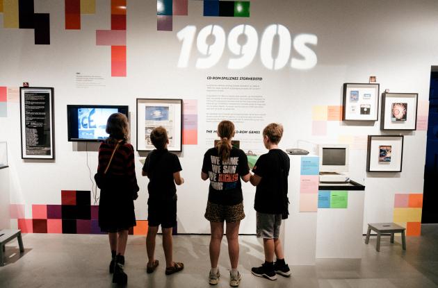 Children look at the display wall from DKgame