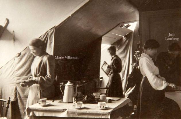 Studio with sloping walls. On the far left is Mary Willumsen. On the far right is Julie Laurberg.