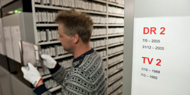 Employee between shelves in the Radio Tv Collection