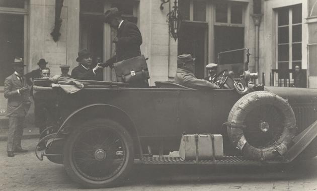 From the Peace Conference in Versailles on May 7, 1919. The German Courier, who brought the Peace Terms to Berlin, leaves the Hotel in the evening.