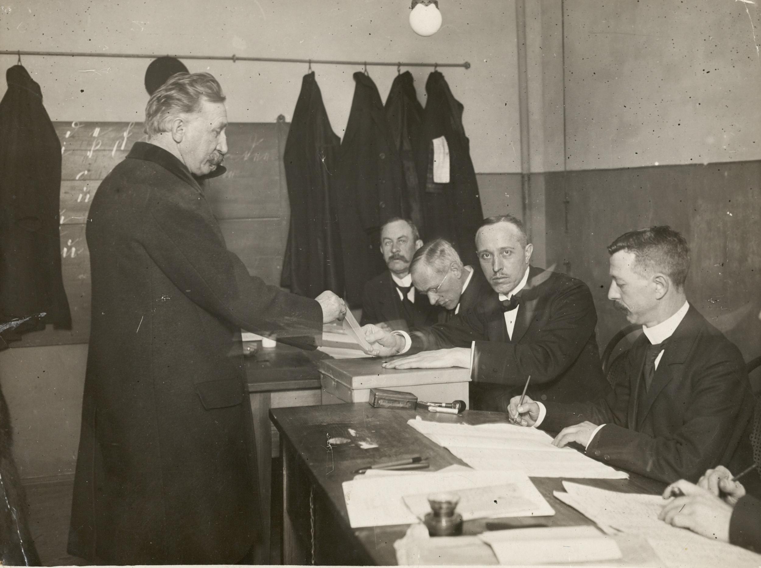H. P. Hanssen casts his vote at an election