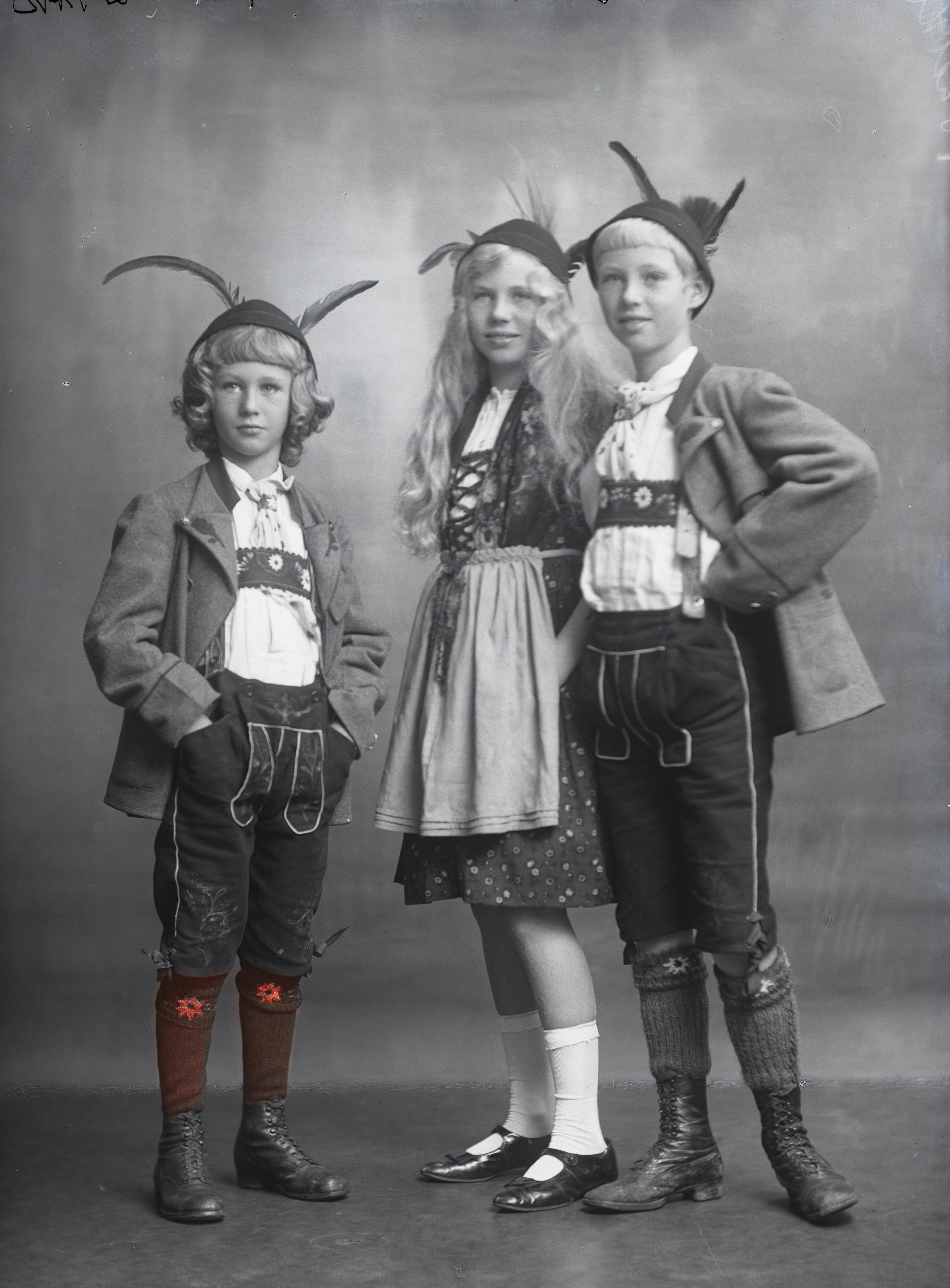 Three children in costume