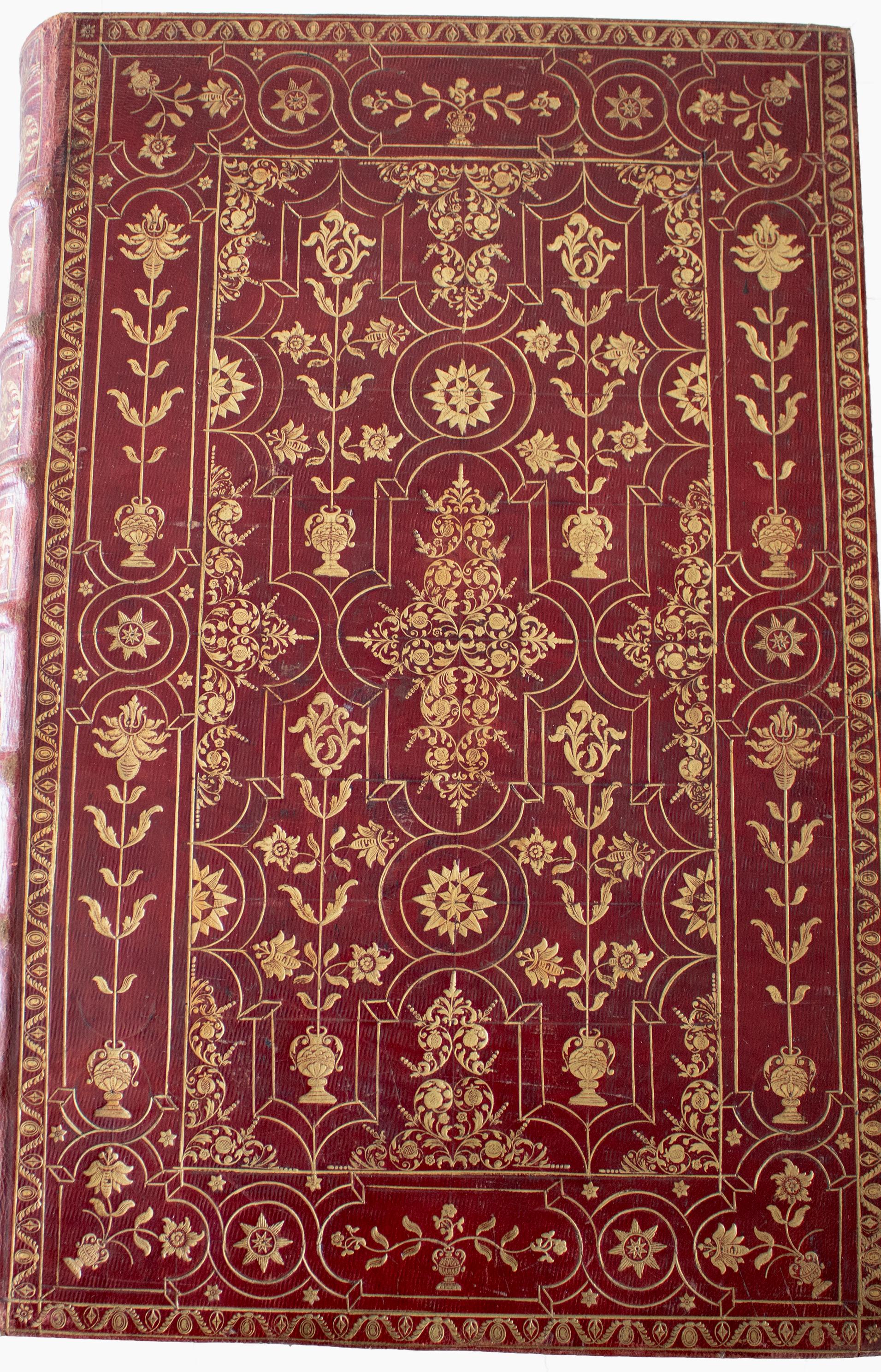 Bogbind; rødt med smukke guld detaljer.