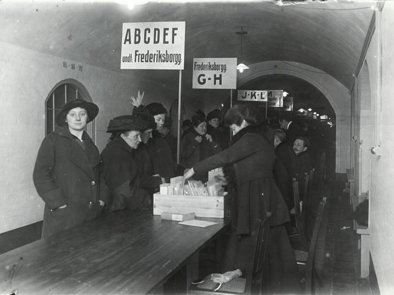 Women attend the polling stations.