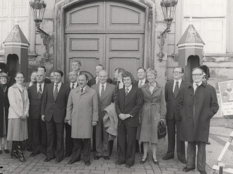  The new government officials pose for a photo in front of the door